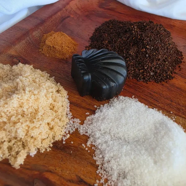 coffee scrub ingredients on wooden block