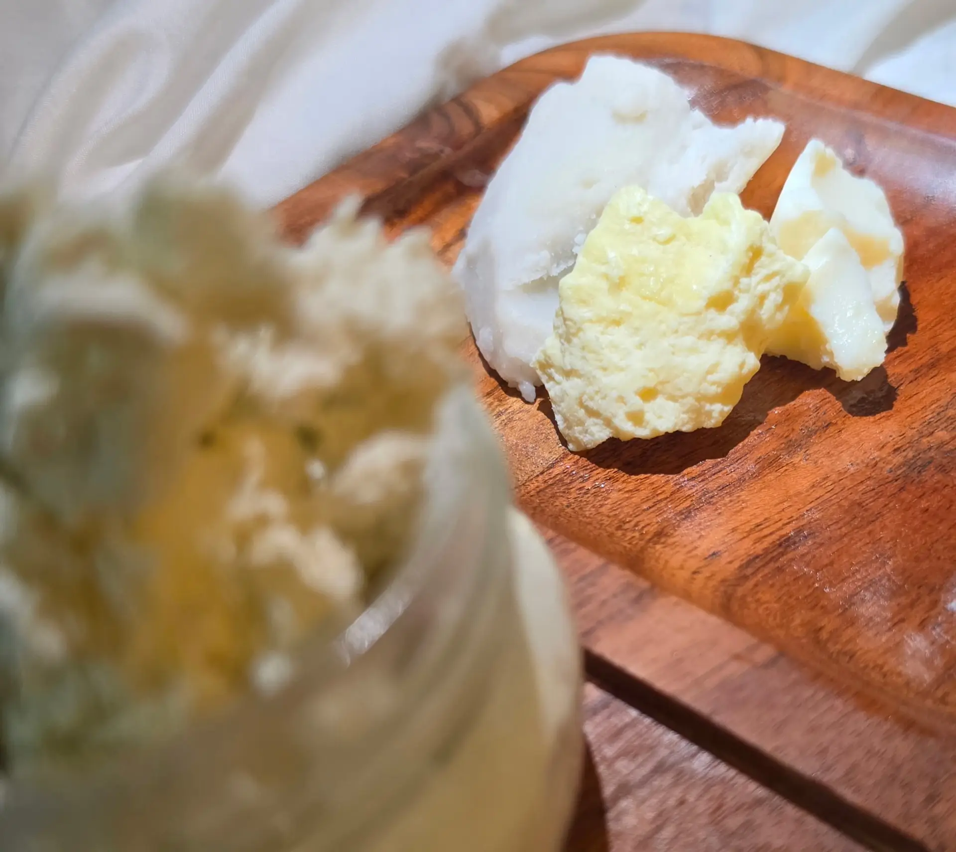 natural butters on wooden block